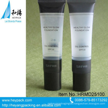 Plastic cosmetic tube container with nozzle